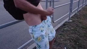 handsome jerking off a dick on the embankment of the plant. EXTREME