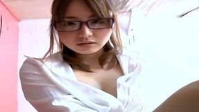 Sultry Japanese strict-looking hussy Saori Yoshikawa poses hot on table