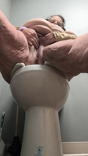 She's Enjoying Rubbing Her Pussy on the Toilet