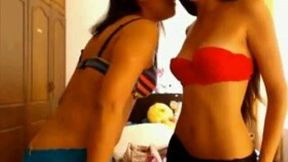 Two slutty slender and sexy brunette cam girls please me with strip show