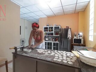 A exposed housewife is preparing dinner in the kitchen. The dissolute whimsical housekeeper Brassiere 1