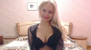 Ardent auburn babe in black gown and lacy lingerie worked on webcam