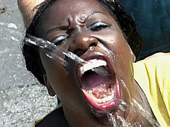 African babe gets pissed over by cocks that she fucks and sucks