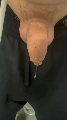 Amateur teen's uncut cock drips precum as he jerks off alone
