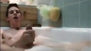 Twink jerking off in bathtub 8