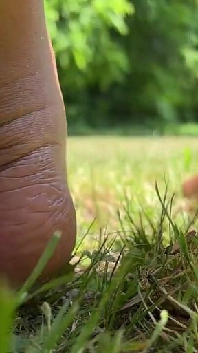 Stepmommy Barefoot Outside Plays in the Grass