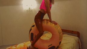 Alla hotly fucks a rare big inflatable ring and wears shiny leggings and shoes with very high heels and an inflatable vest!!!