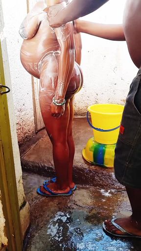 Outdoor bathing my pregnant girlfriend in dirty environment.