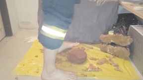 Firefighter stomping a Cake