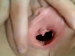 Roxane shows her cute gaping pussy