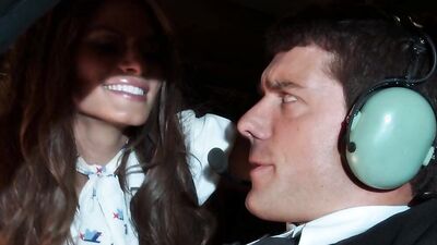 Gorgeous stewardess and horny pilot are having sex in the cockpit