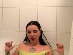Bubble Bath Time for This Tattooed Brunette