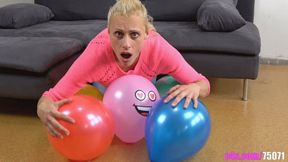 Watch Brittany inflate and pop colorful balloons in a playful and thrilling display! (4K quality)