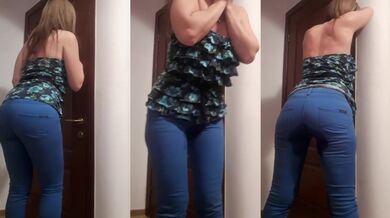 Her jeans soaked as she pisses her desperation behind the locked bathroom door
