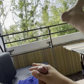 Cumming on the Balcony