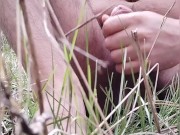 Young guy masturbates in the mountains