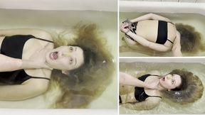 Milana is bound with a rope and held underwater