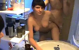 Brunette gets fucked in the bathroom