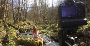 Behind scene from shooting huge tits redhead Alexsis Faye outddor in the small river