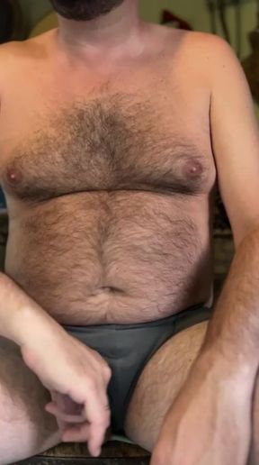Hairy and gut-strapped cowboy trucker jerks off his small cock