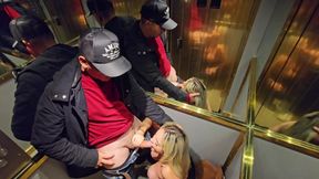Blonde babe gives a dirty blowjob in public elevator