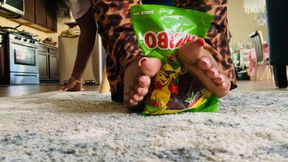 Putting gummy’s on my toes long toes