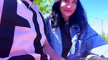 Amateur brunette is often giving blowjobs to random strangers in public places, during the day