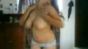 Joyful Latina sweetheart dances for me topless