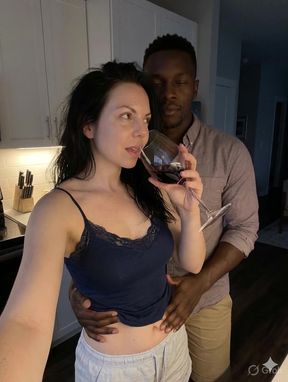 Homemade couple shares a kiss in an interracial encounter