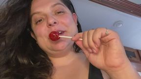 Sucking on sucker - Red Tongue