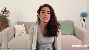 Masturbation on the couch with curly girl rubbing her hairy pussy