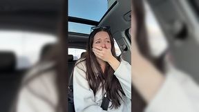 Horny brunette drives car as her pussy is being by vibrator