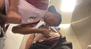 cruising with a curious straight guy in the university bathroom
