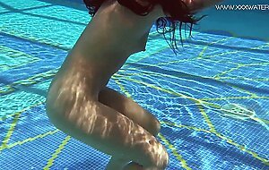 Jessica Lincoln gets horny and naked in the pool