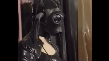 Natalia Muehlhausen latex slave in hood and gasmask gets a good fuck from her master (from &#039_Gummi in der Ehe&#039_)