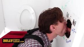 ”Bully Him - Innocent Geeky Boy Wraps His Puffy Lips Around Thick Dick Coming Out Of A Glory Hole”