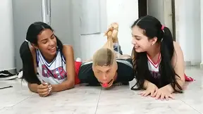 Football Player Pantyhosed And Hogtied On The Floor By Two Cheerleaders!