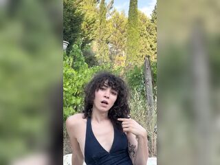 A T-girl Screws Herself with as Many Fingers as Possible