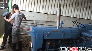 Thin teenage gay shoots semen over farm equipment after anal