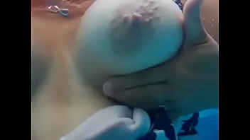 BBW DD tits float in the pool