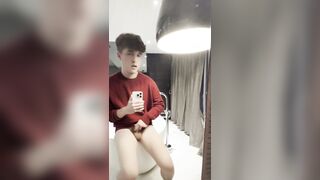 Youngster with phimosis jerks in tub