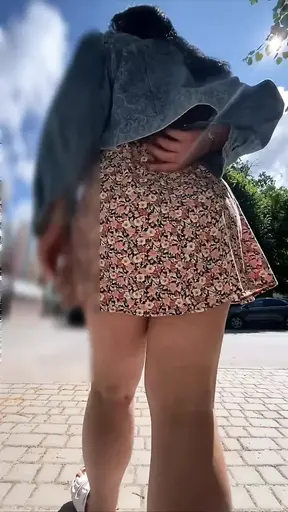 Milf walks around the store without panties