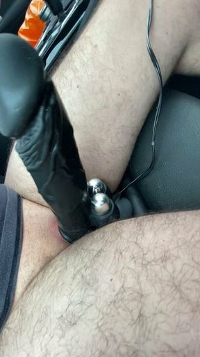 Playing with cock sleeve whilst driving