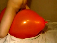 Big inflatable orange balloon humping cum