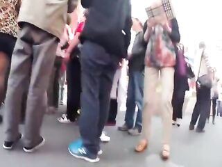 teen upskirt in street with red frilly petticoat