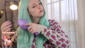 Cute Girl Brushes Her Hair
