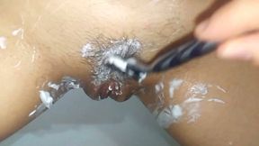 My friend helps his kinky girlfriend to shave her hairy cunt