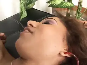 Dark-hair babe sucks and takes thick black dick in living room