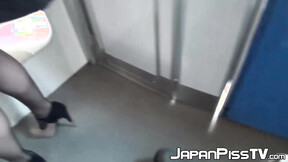 Japanese brunette  close up peeing in train