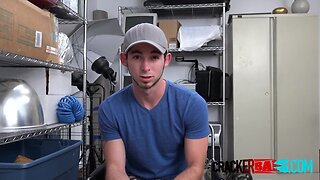 Teenage jock is placed on directors desk to take his large ebony pecker